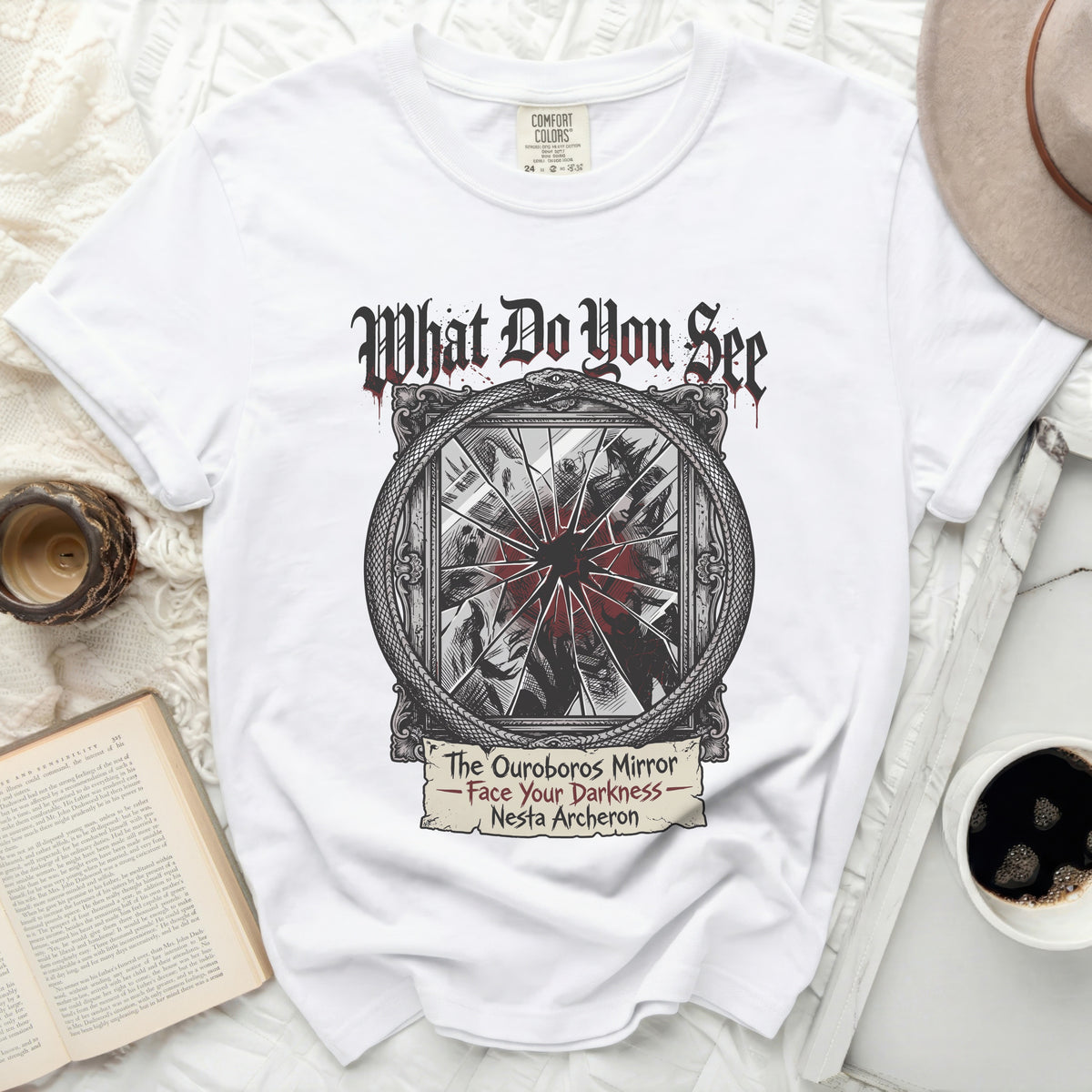 White t-shirt with "What Do You See" and broken mirror design.