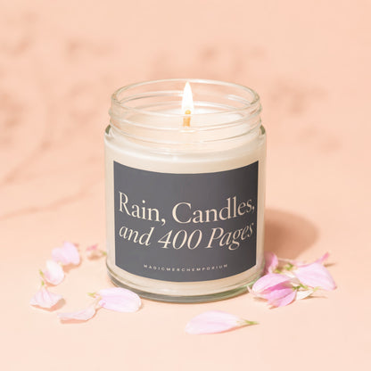 Glass candle labeled "Rain, Candles, and 400 Pages" with pink petals.