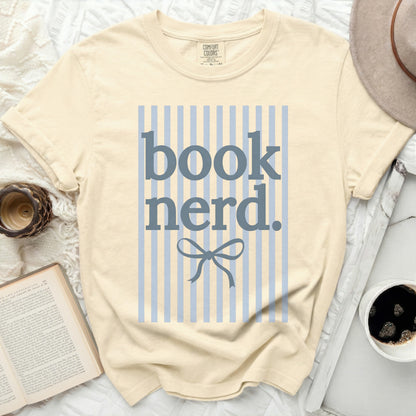 Cream t-shirt with blue stripes and "book nerd." text.