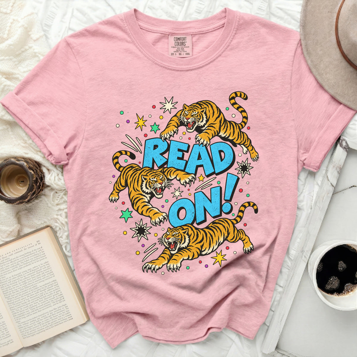 Pink t-shirt with three tigers and "READ ON!" text graphic.
