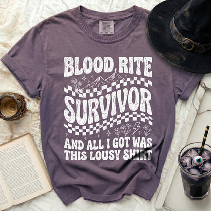 Purple t-shirt with "Blood Rite Survivor and all I got was this lousy shirt" graphic.