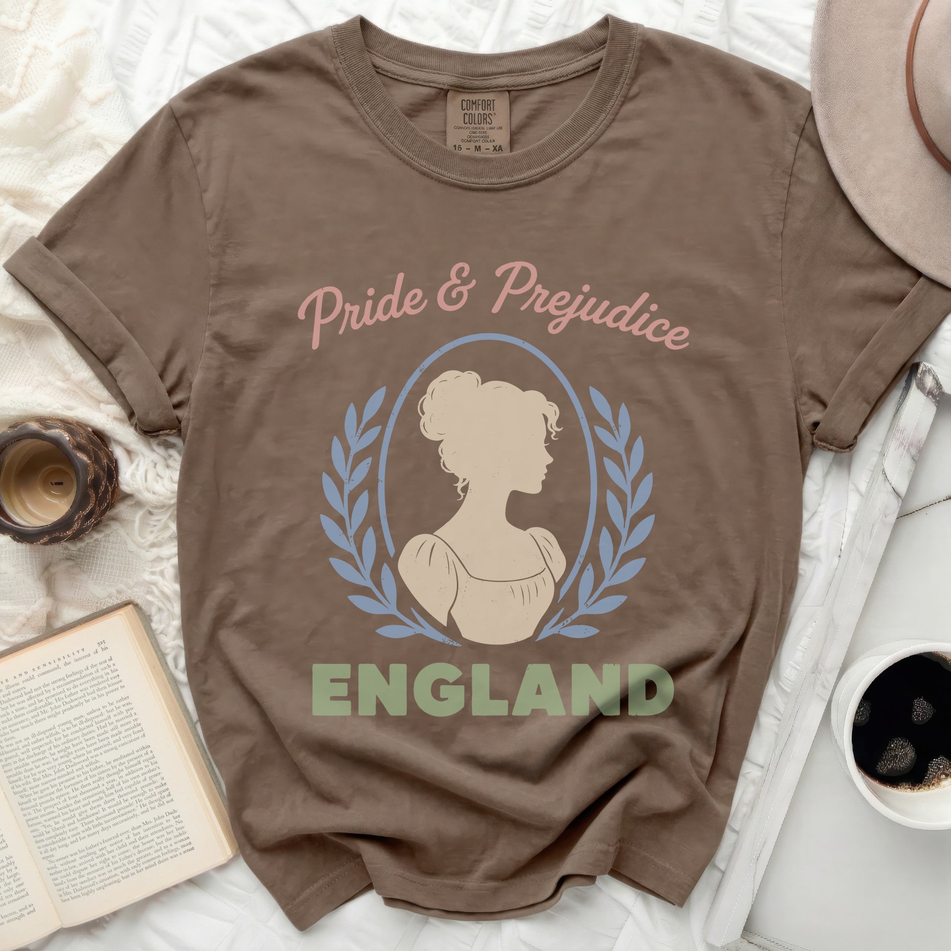 Brown t-shirt with Pride & Prejudice graphic and silhouette.