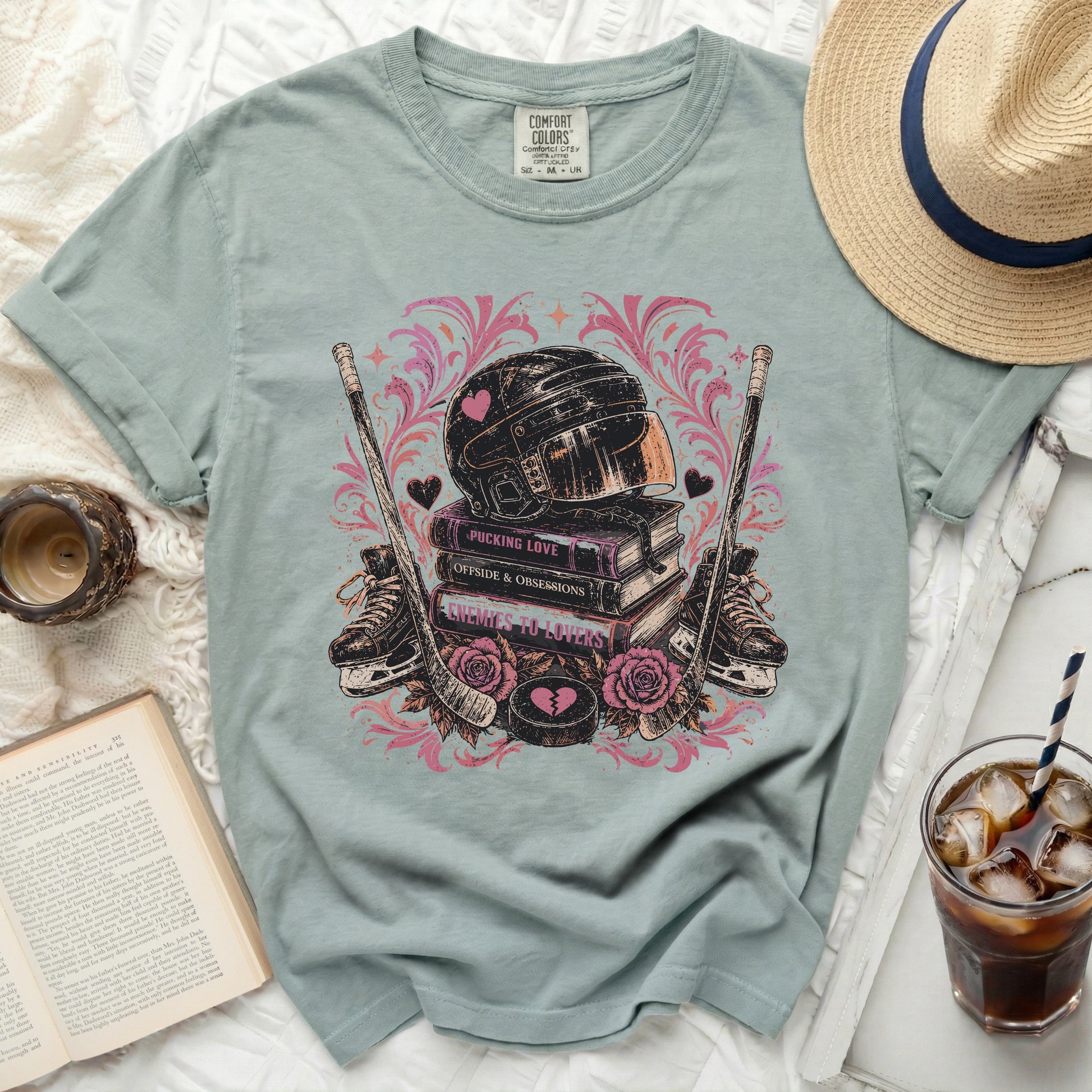 T-shirt with hockey helmet, skates, and text "Pucking Love".