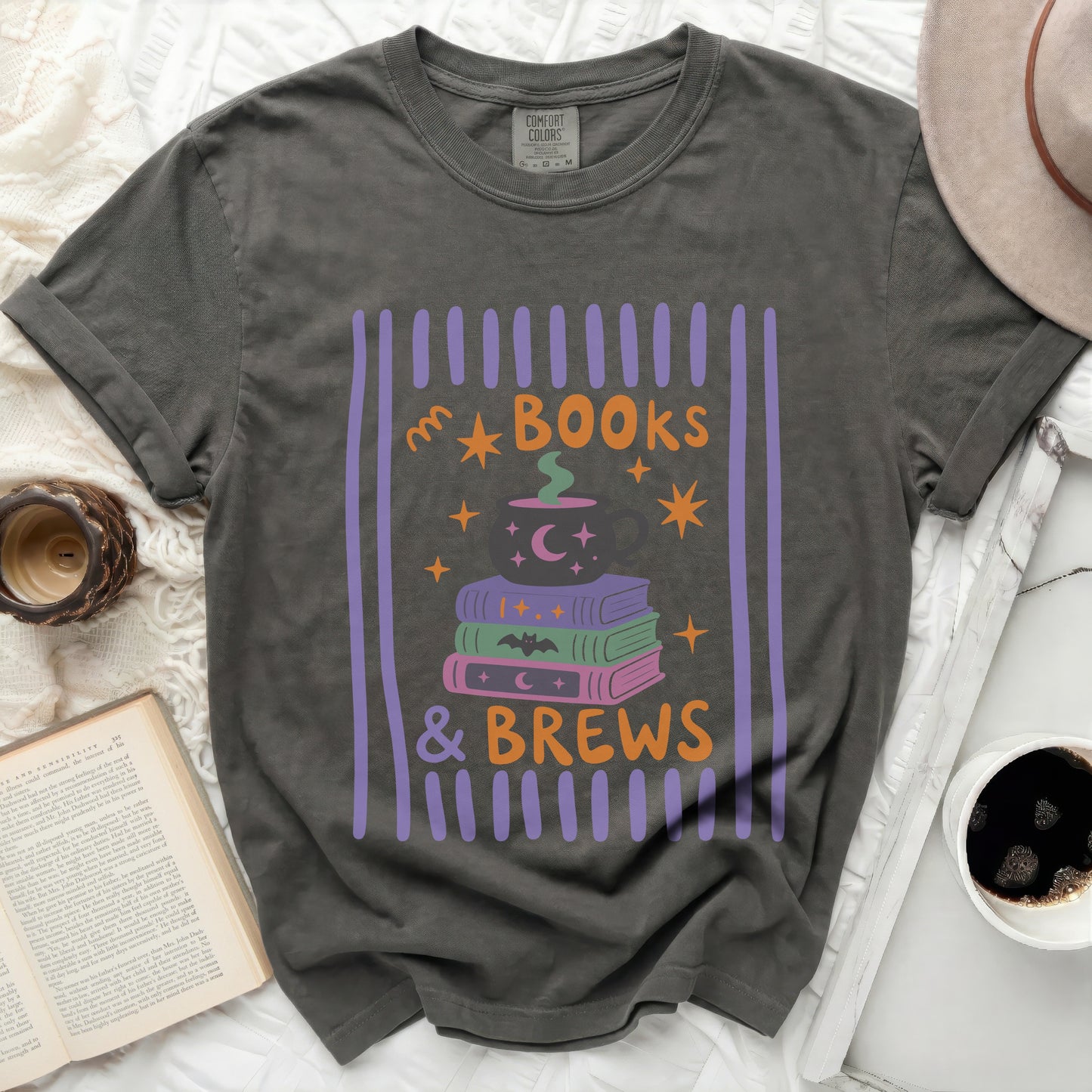 Dark gray t-shirt with "Books & Brews" text and Halloween themed graphics.