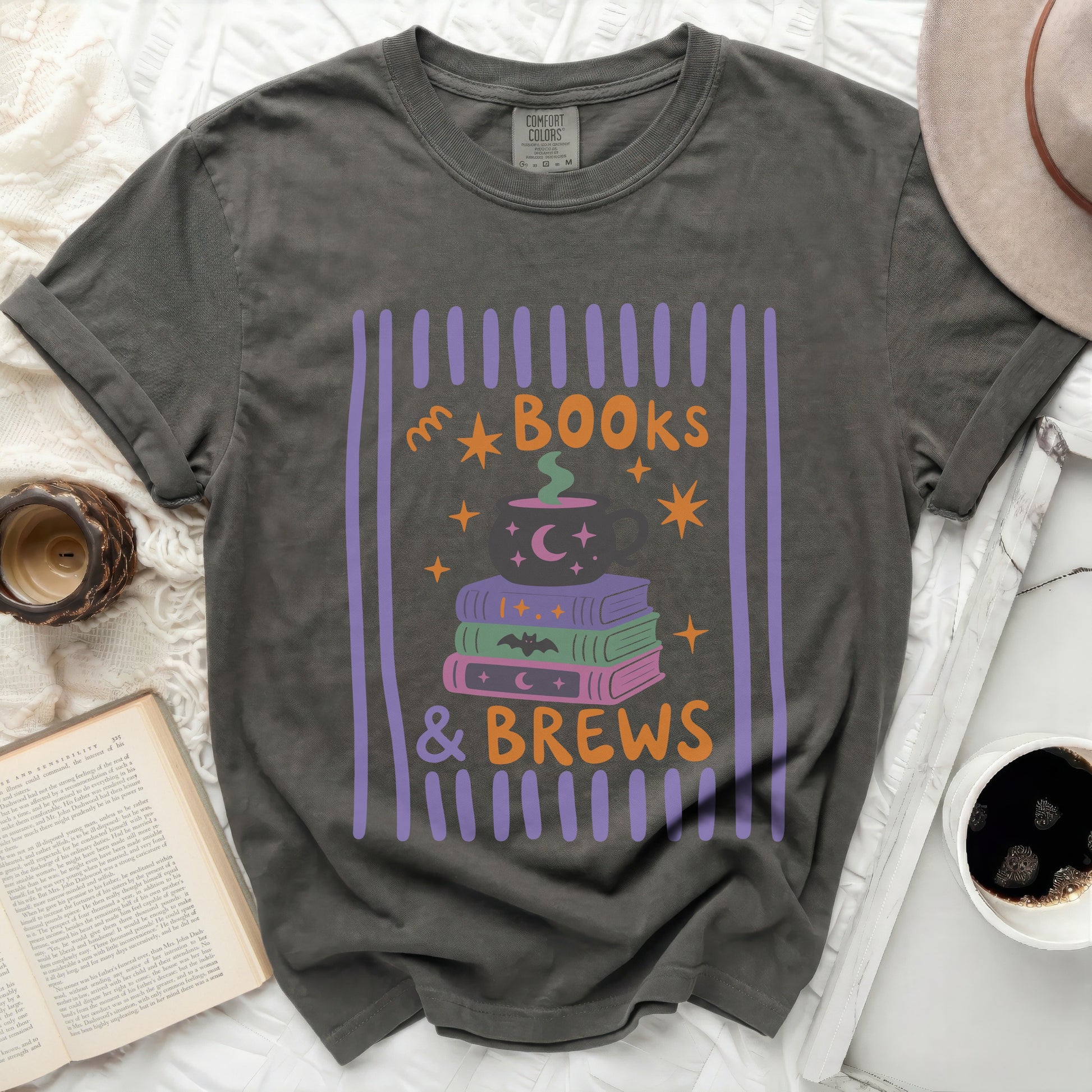 Dark gray t-shirt with "Books & Brews" text and Halloween themed graphics.