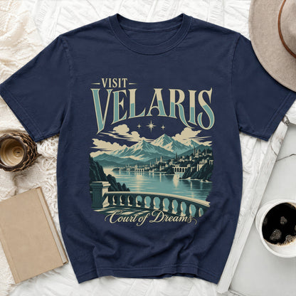 Navy t-shirt with "Visit Velaris" and "Court of Dreams" text and scenic illustration.