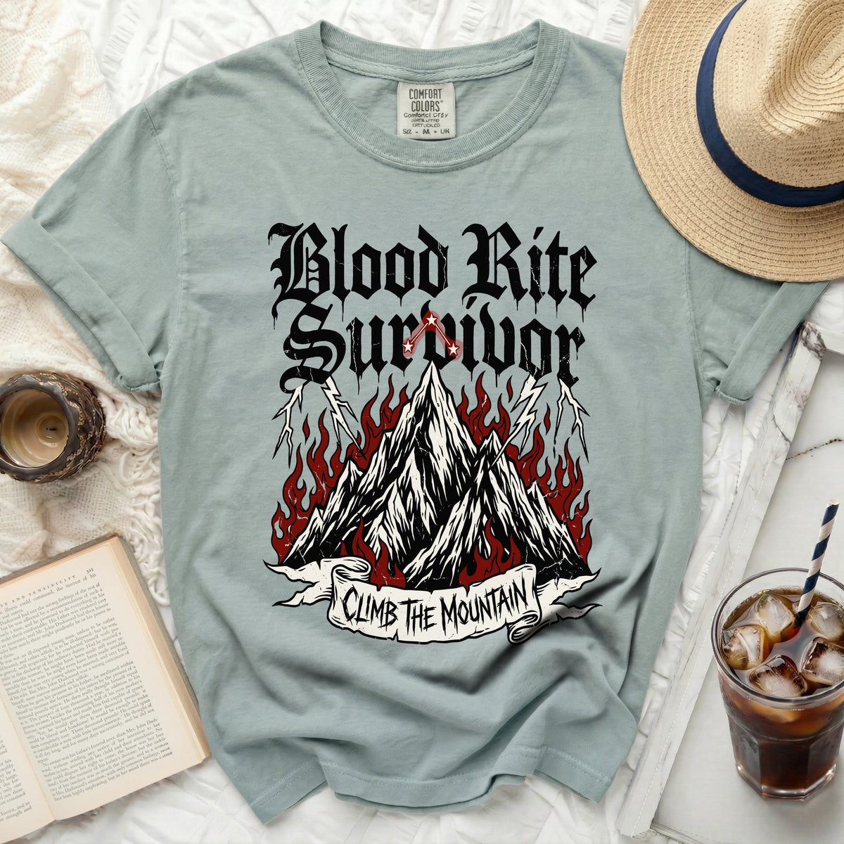 "Blood Rite Survivor" graphic t-shirt with mountains and flames.