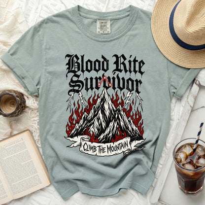 "Blood Rite Survivor" graphic t-shirt with mountains and flames.