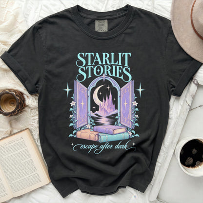 Black t-shirt with "Starlit Stories" text and a fantasy scene of a castle.