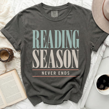 Gray t-shirt with "READING SEASON NEVER ENDS" text design.