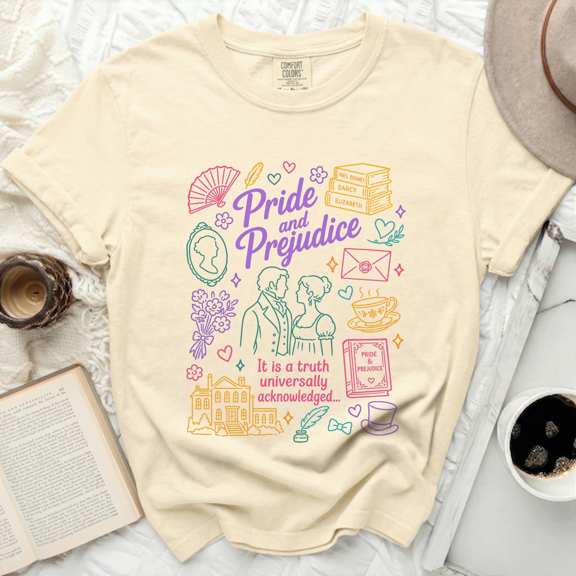 Pride and Prejudice graphic tee with stylized illustrations and English text.
