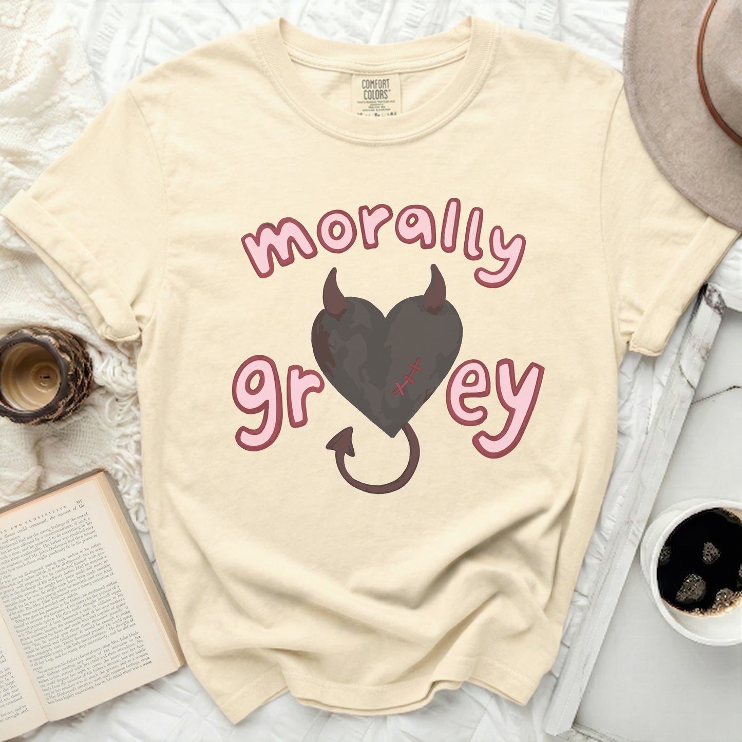 Cream t-shirt with "morally grey" text and a black heart graphic.