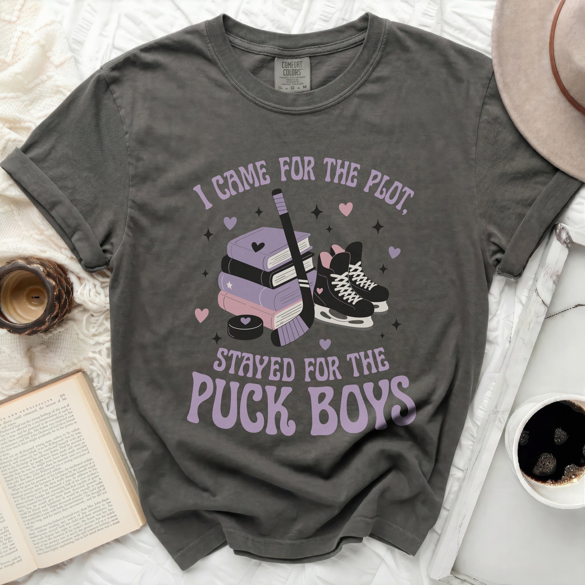 Dark grey t-shirt with "I came for the plot, stayed for the puck boys" text.