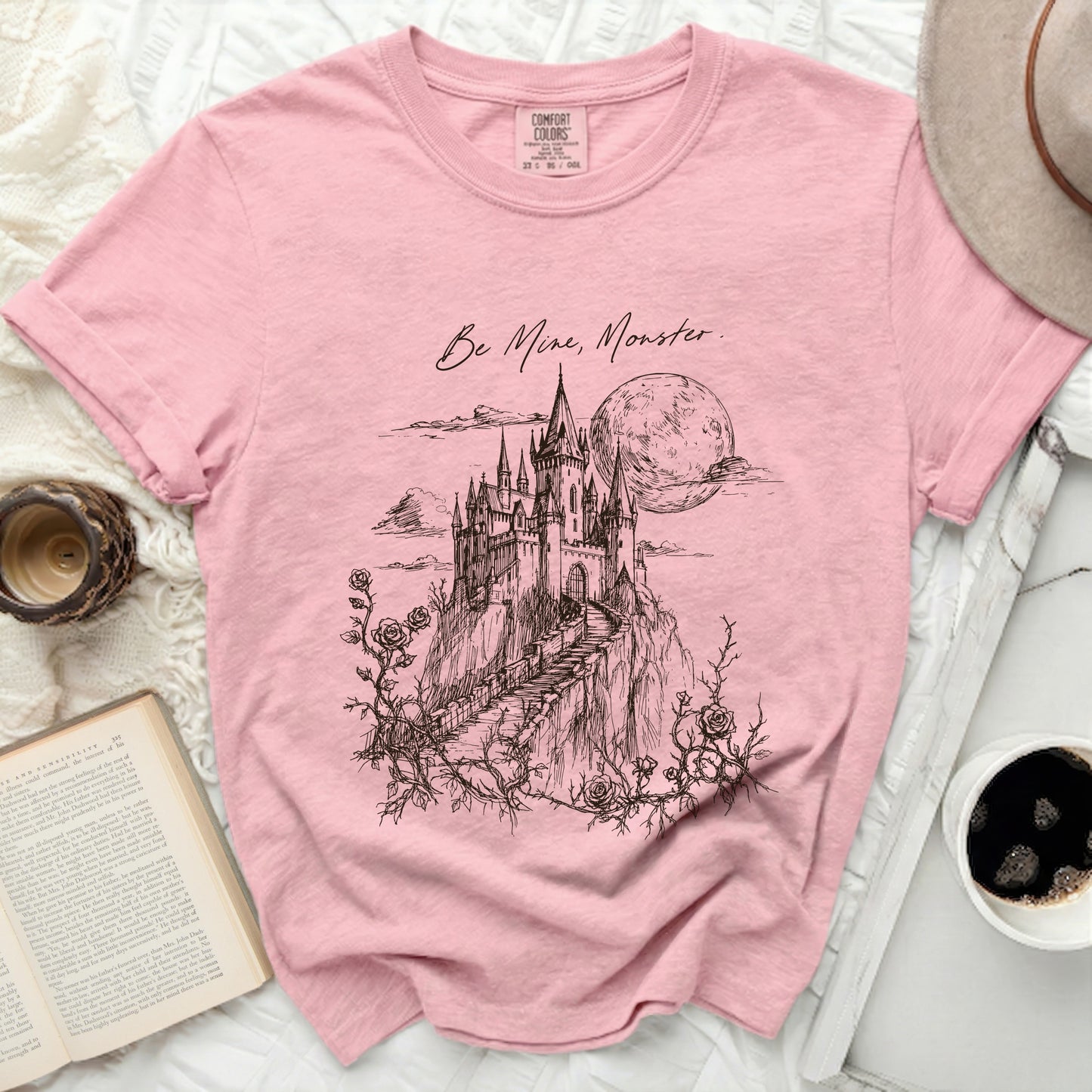 Pink t-shirt with "Be Mine, Monster." castle illustration and roses.