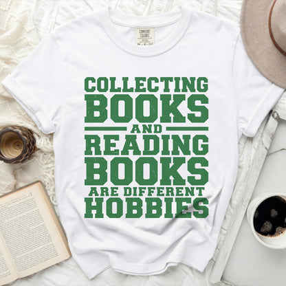 White t-shirt with green text: "Collecting Books and Reading Books Are Different Hobbies".