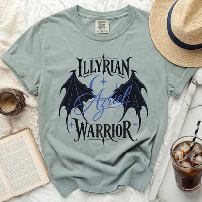 Light blue t-shirt with "ILLYRIAN Azriel WARRIOR" text and dragon wings graphic.