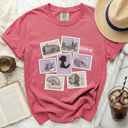 Pink t-shirt with "Pride and Prejudice" themed postage stamps.