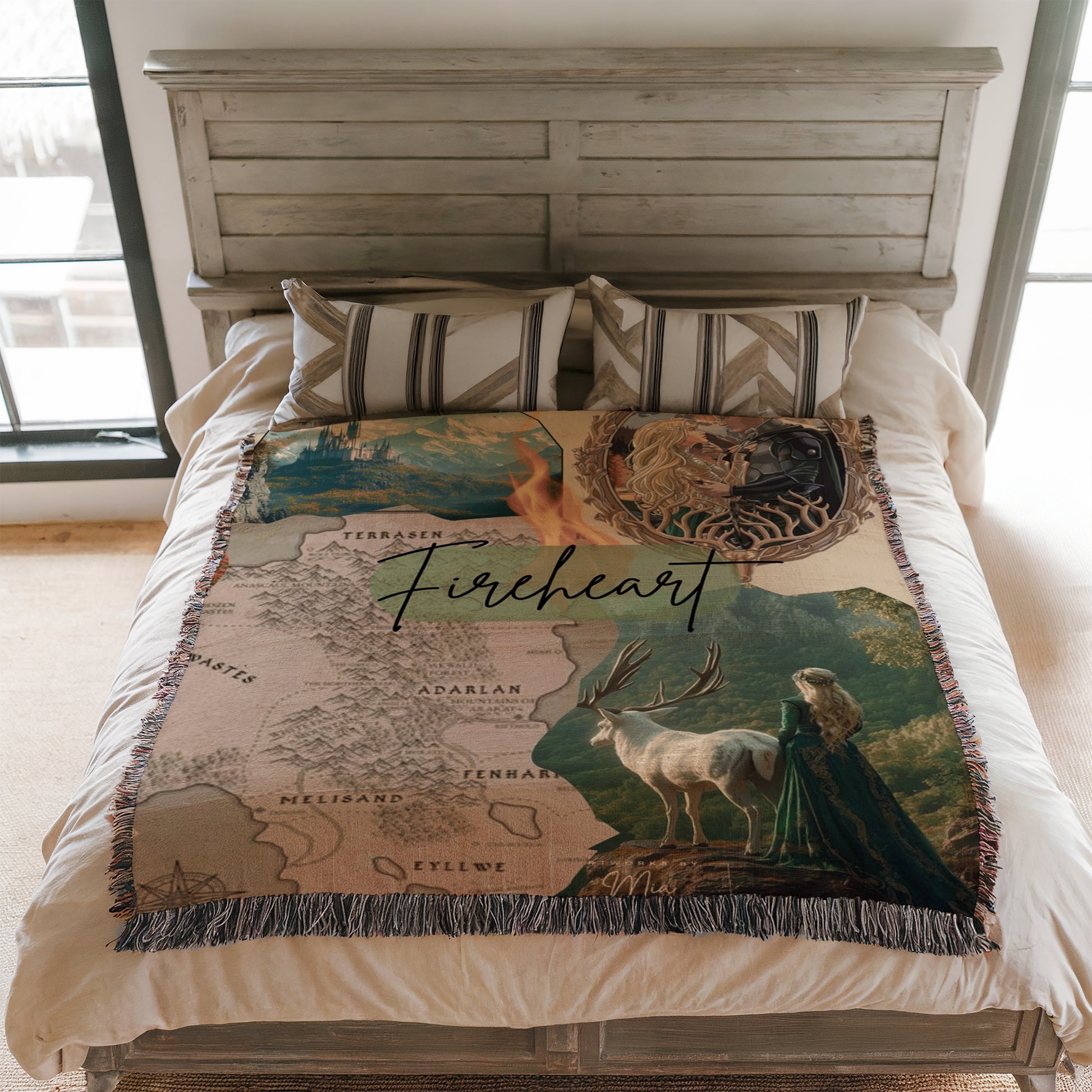 a bedroom with a bed covered in a blanket that has a map and a woman in a green dress on it.