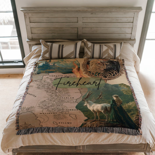a bedroom with a bed covered in a blanket that has a map and a woman in a green dress on it.