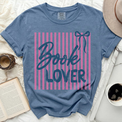 Blue t-shirt with pink stripes and "Book Lover" text.