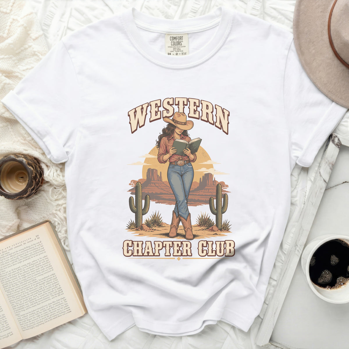 White t-shirt with "Western Chapter Club" graphic of a cowgirl reading.
