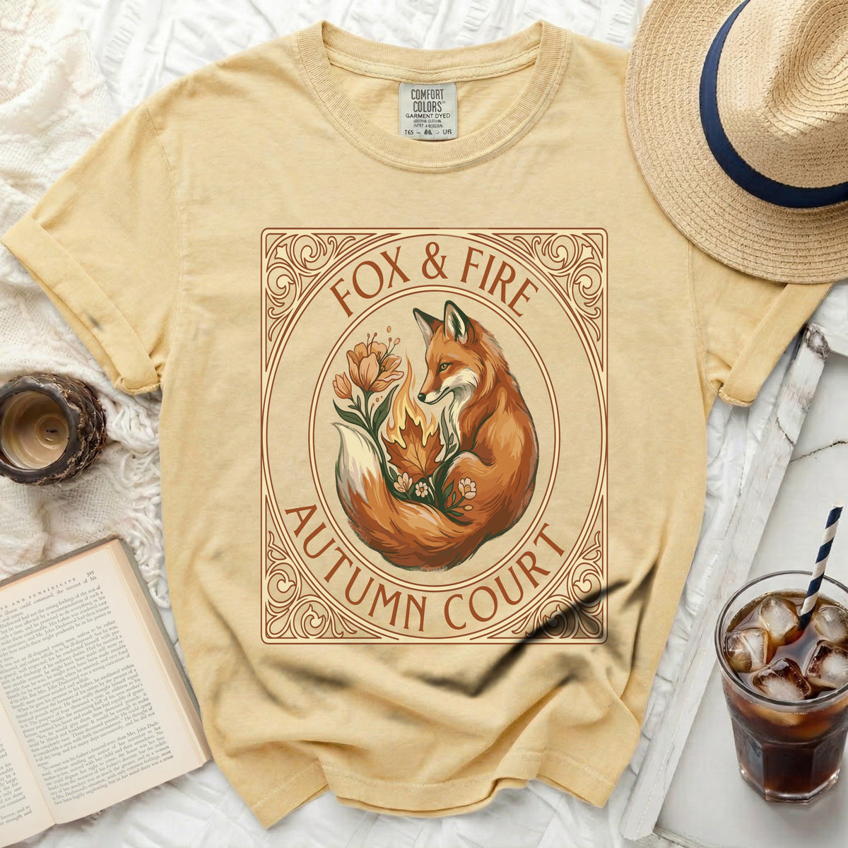 Yellow t-shirt with "Fox & Fire Autumn Court" graphic of a fox and autumn leaves.