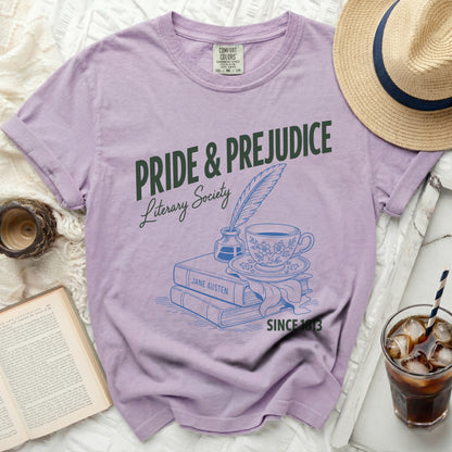Lilac t-shirt with "Pride & Prejudice Literary Society Since 1813" text and book design.