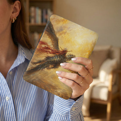 Woman holding a tablet with a painted dragon and rider, golden background.
