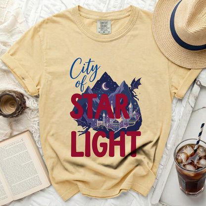 Yellow t-shirt with "City of Star Light" graphic and dragon silhouette.
