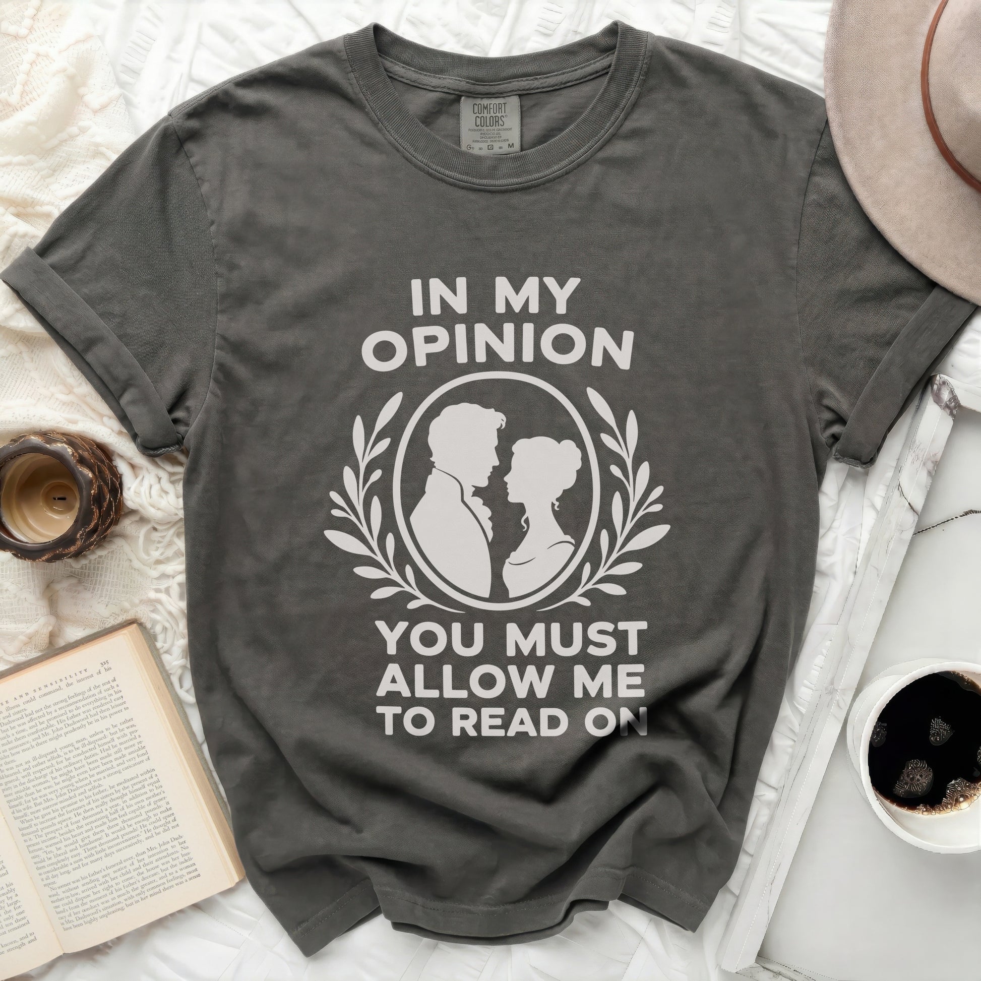 Gray t-shirt with "In My Opinion, You Must Allow Me To Read On" graphic.