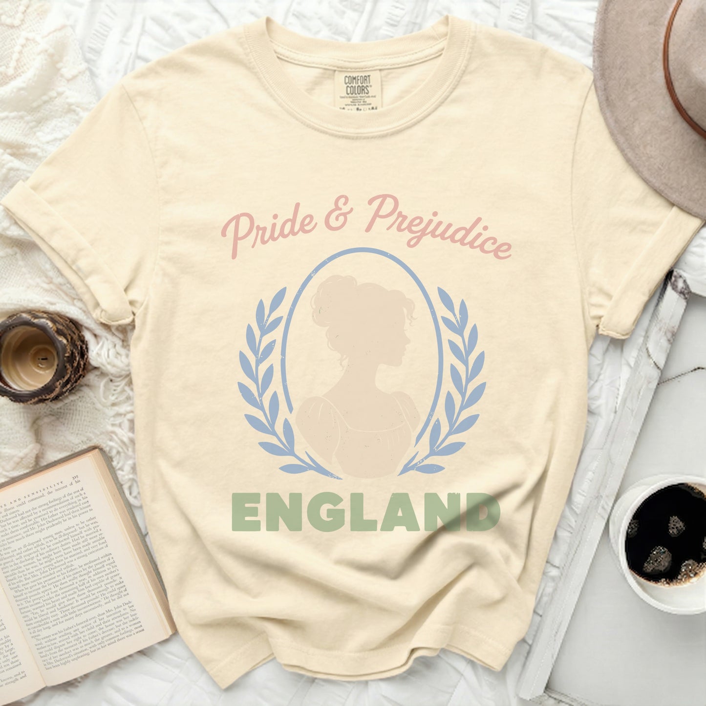 Cream t-shirt with "Pride & Prejudice England" and silhouette.