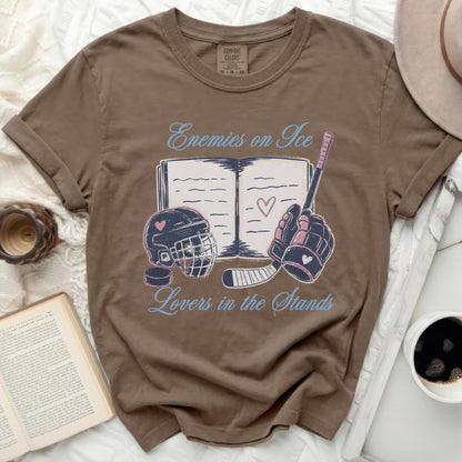 Brown t-shirt with "Enemies on Ice Lovers in the Stands" graphic.