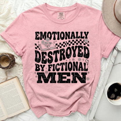 Pink t-shirt with "Emotionally Destroyed by Fictional Men" graphic.