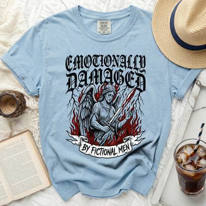 Light blue t-shirt with "Emotionally Damaged By Fictional Men" graphic.