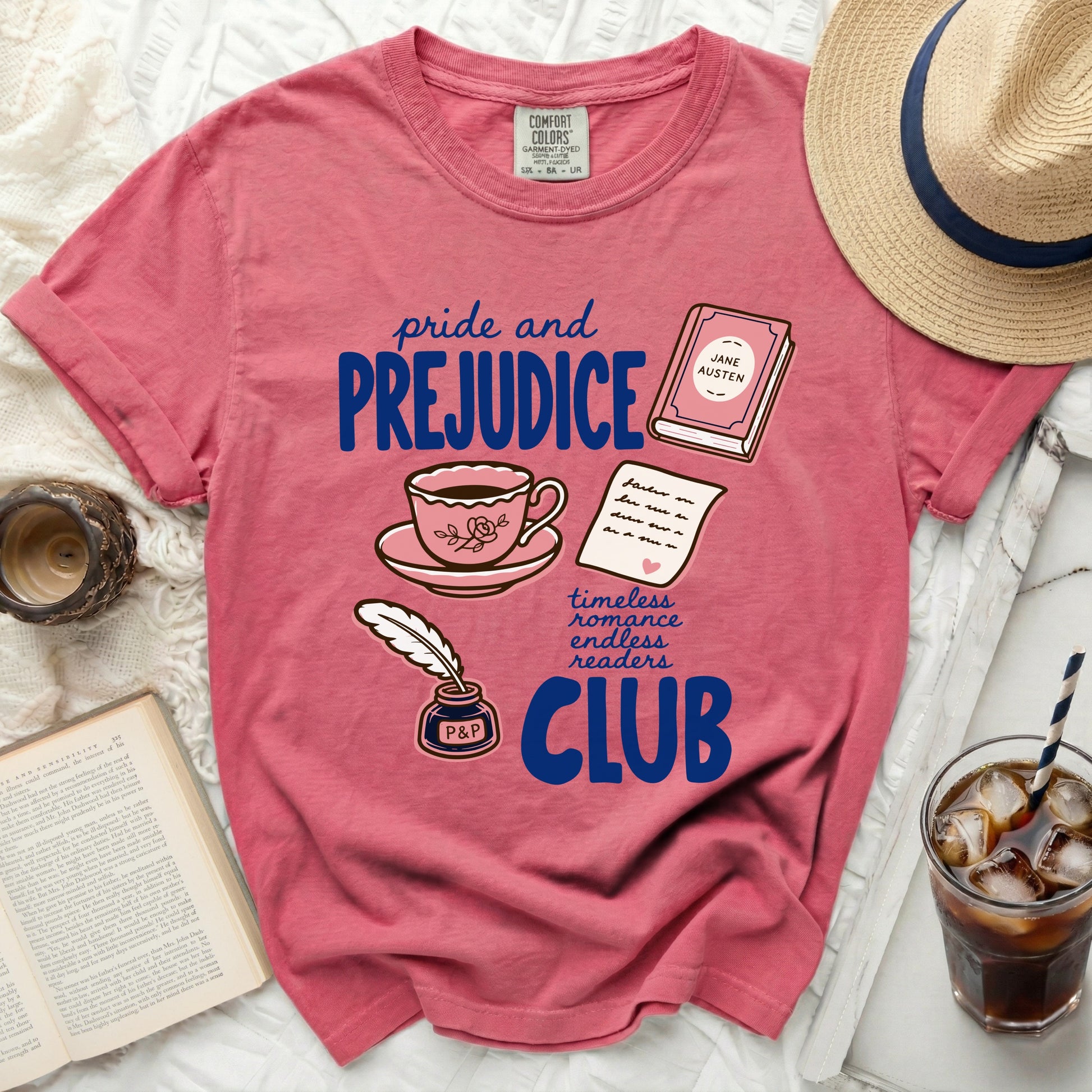 Pride and Prejudice Club graphic tee with literary icons.