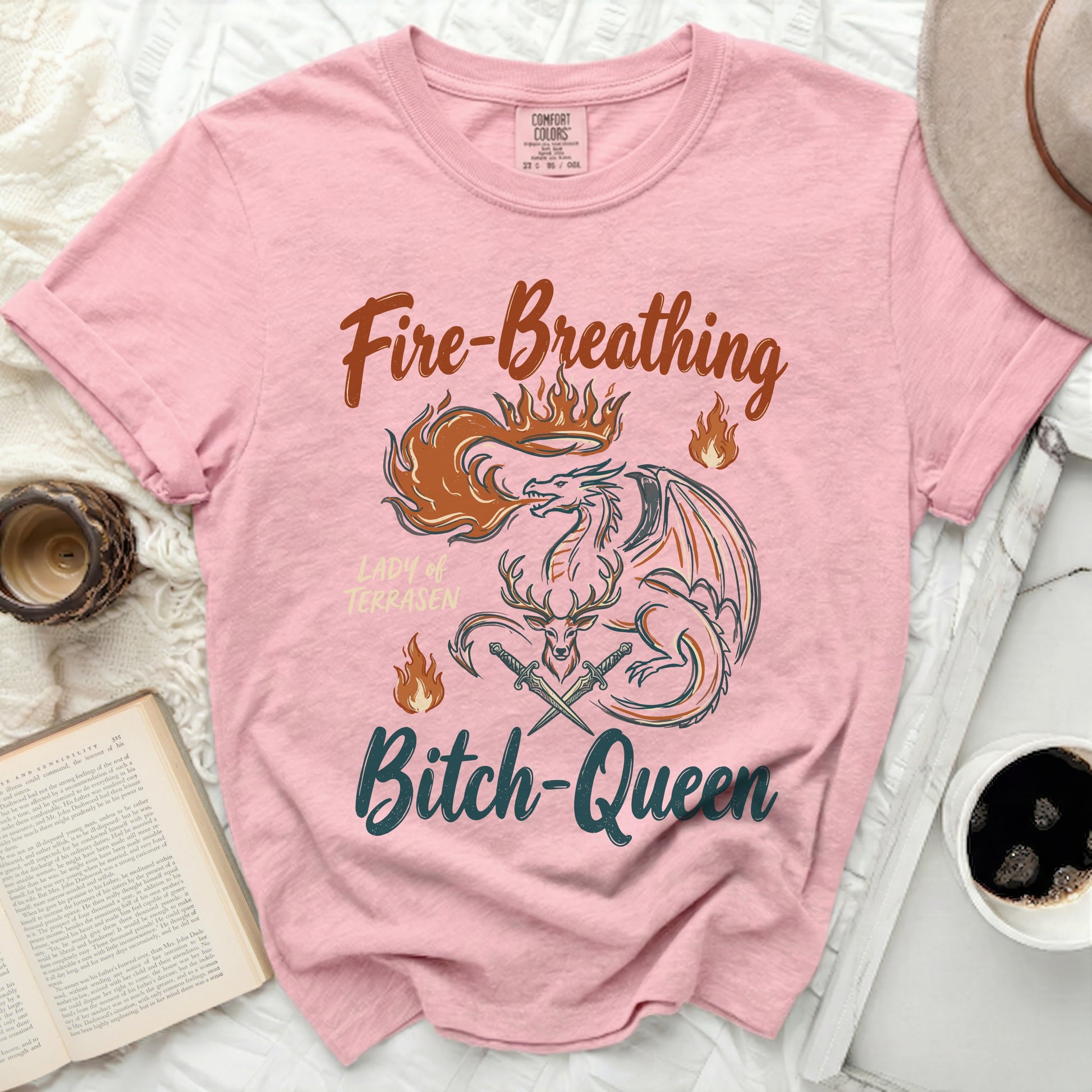 Pink t-shirt with dragon, deer antlers, and text "Fire-Breathing Lady of Terrasen Bitch-Queen".