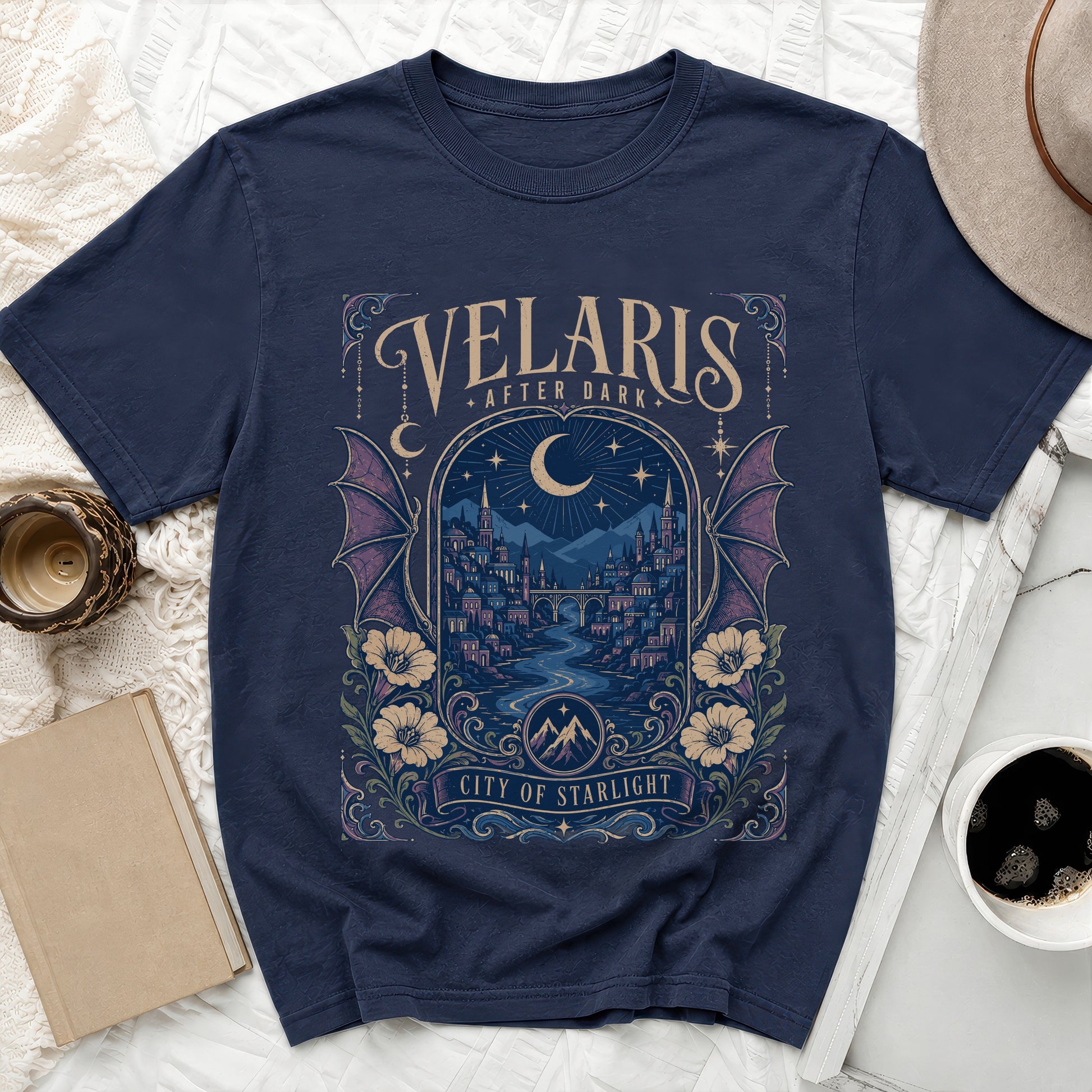 Navy t-shirt with "Velaris After Dark City of Starlight" text and fantasy city design.