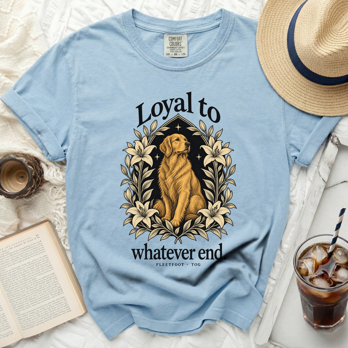Light blue t-shirt with golden retriever and floral graphic, "Loyal to whatever end".