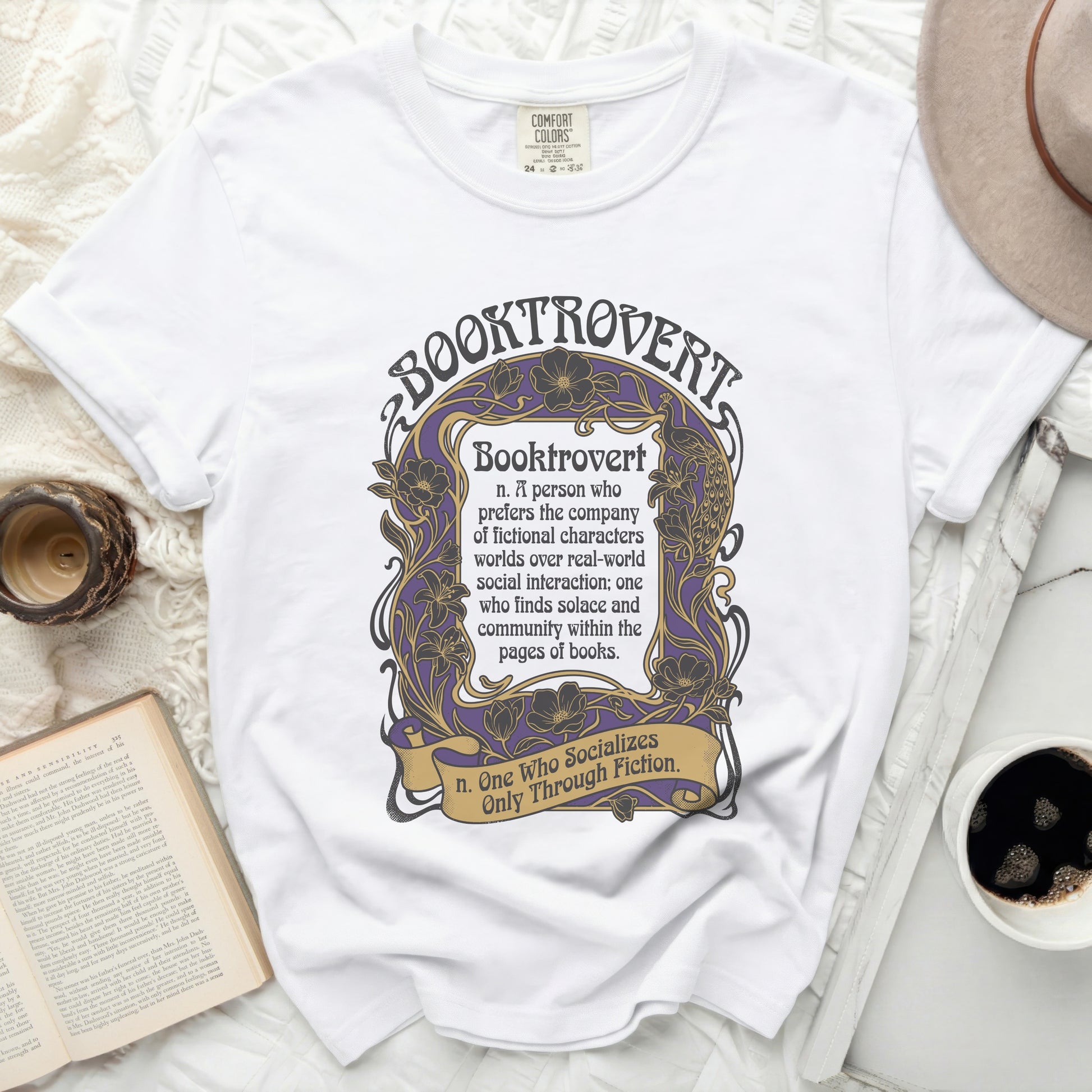 White Comfort Colors t-shirt with "Booktrovert" definition and illustration.