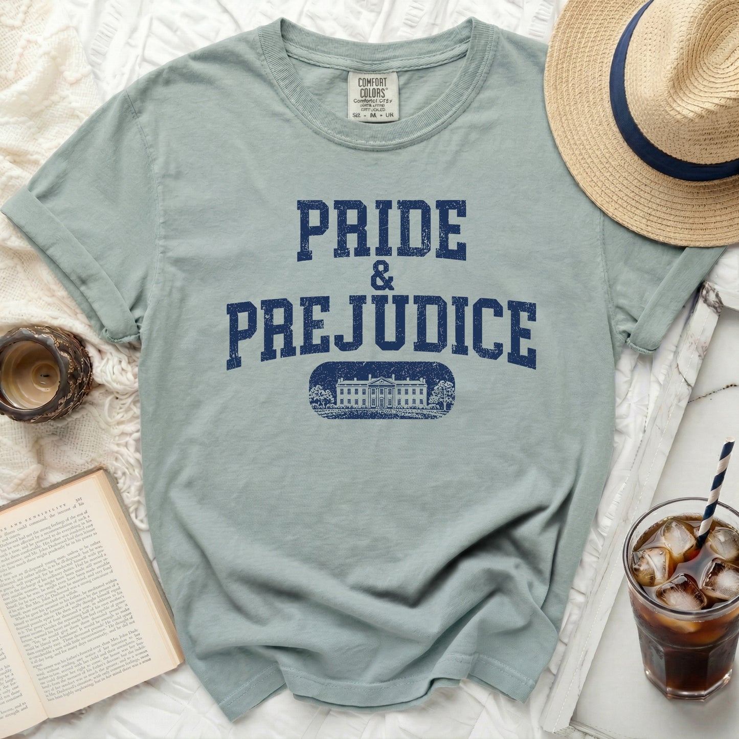 Pride & Prejudice graphic t-shirt with distressed navy print.