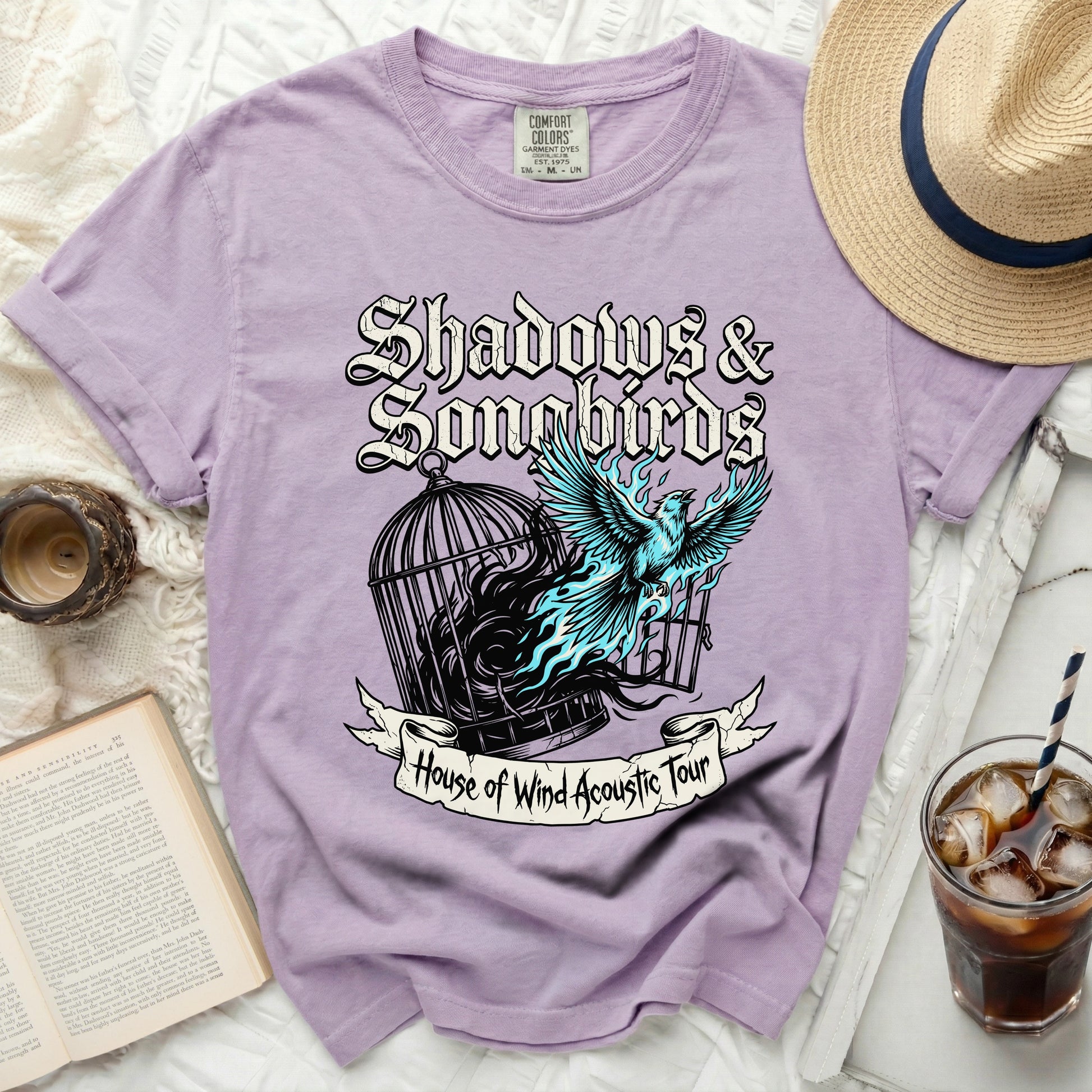 Purple t-shirt with "Shadows & Songbirds" and "House of Wind Acoustic Tour" graphic.
