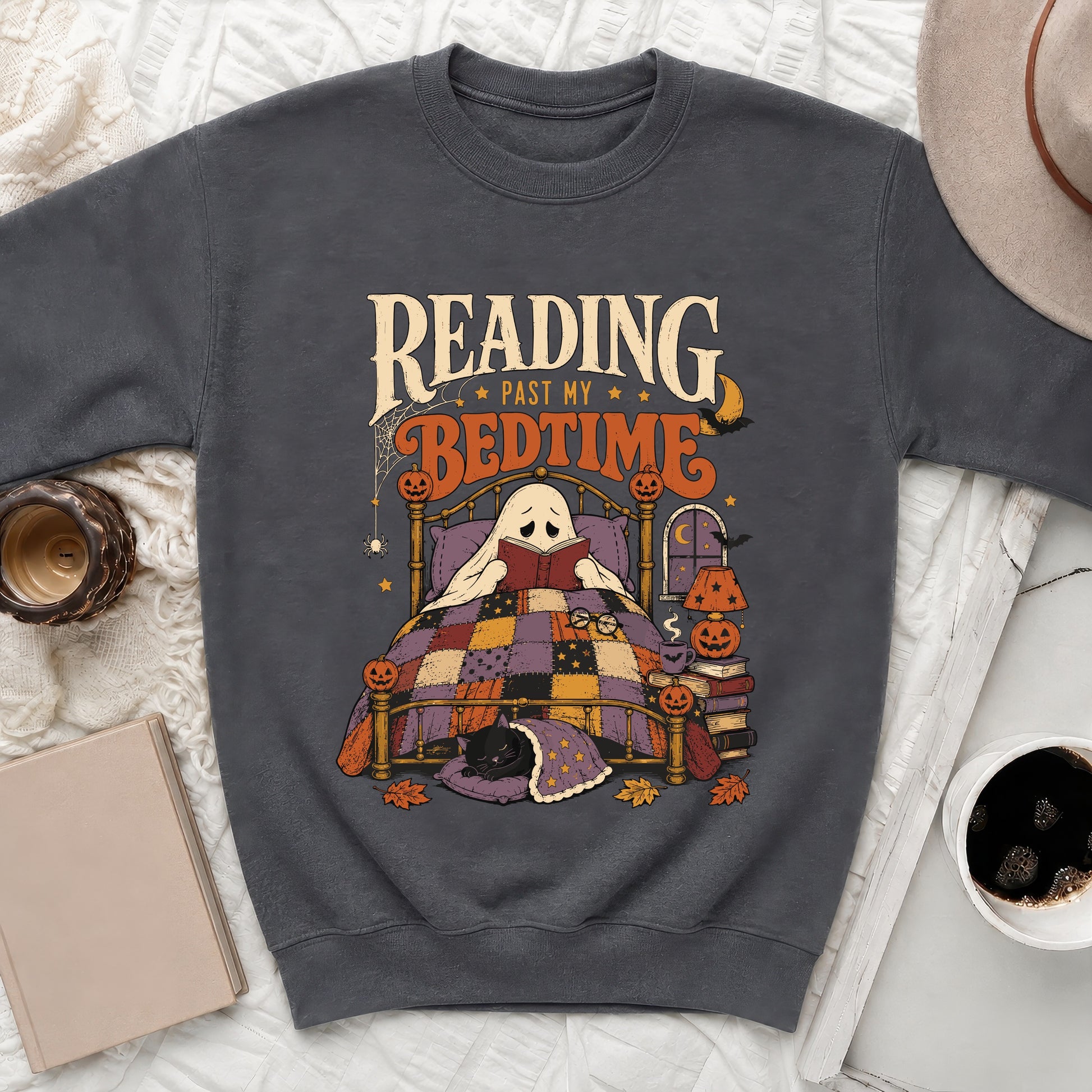 Ghost reading a book in bed with a black cat and Halloween decor, "Reading Past My Bedtime" text.