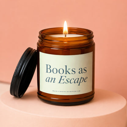 Lit amber glass candle with a creamy label reading "Books as an Escape".