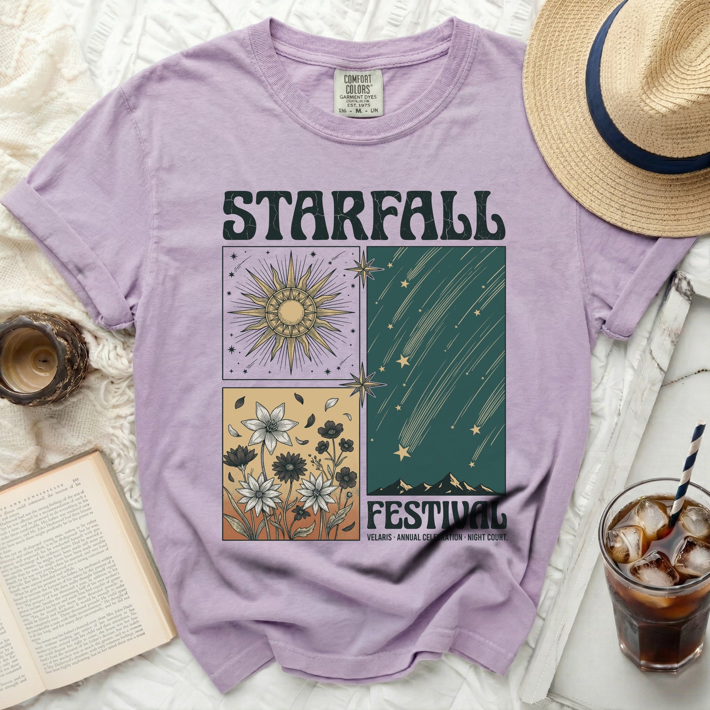 Purple t-shirt with "Starfall Festival" graphic featuring sun, flowers, and shooting stars.