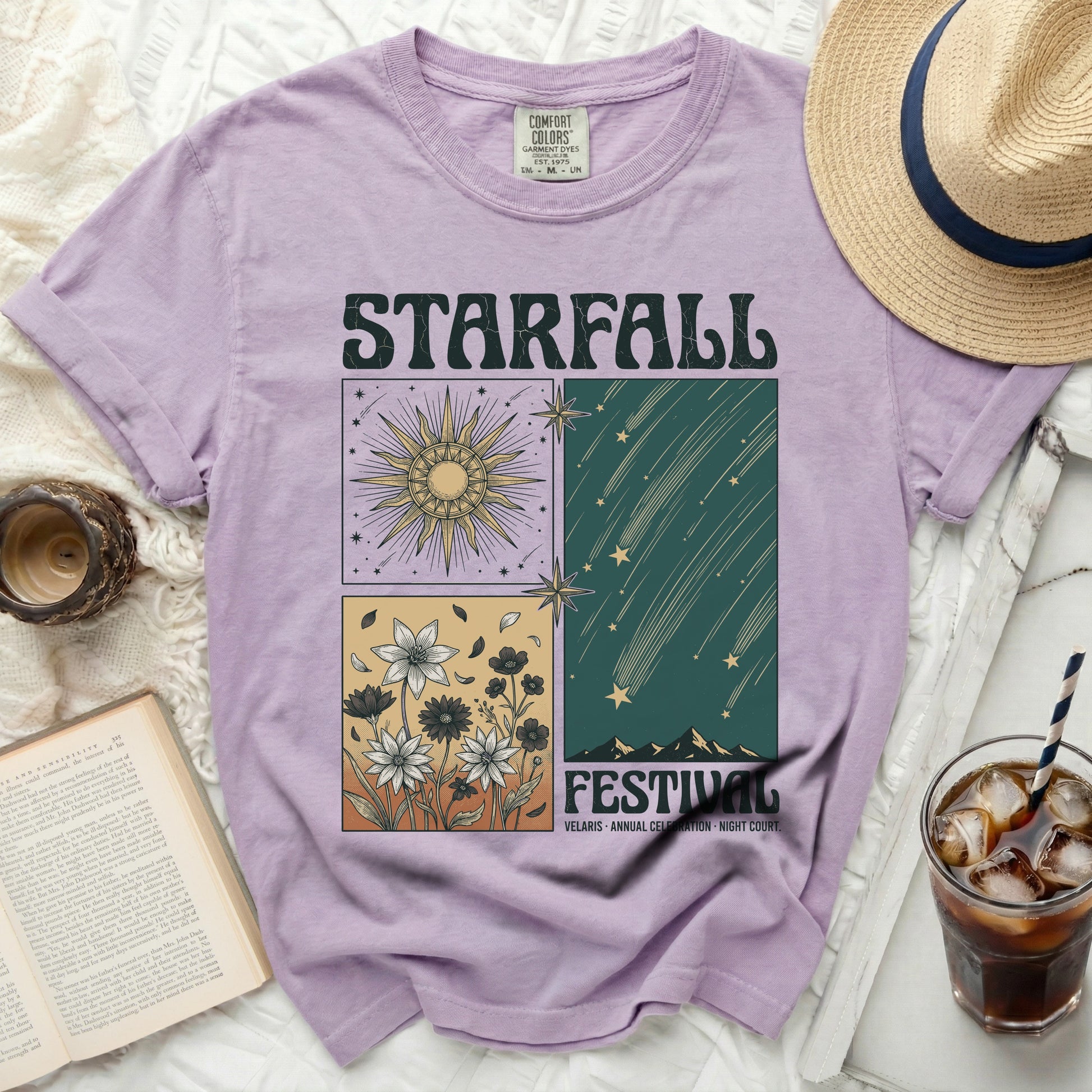 Purple t-shirt with "Starfall Festival" graphic featuring sun, flowers, and shooting stars.