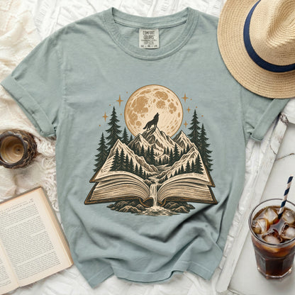 Open book with wolf on mountain under full moon and starry sky.
