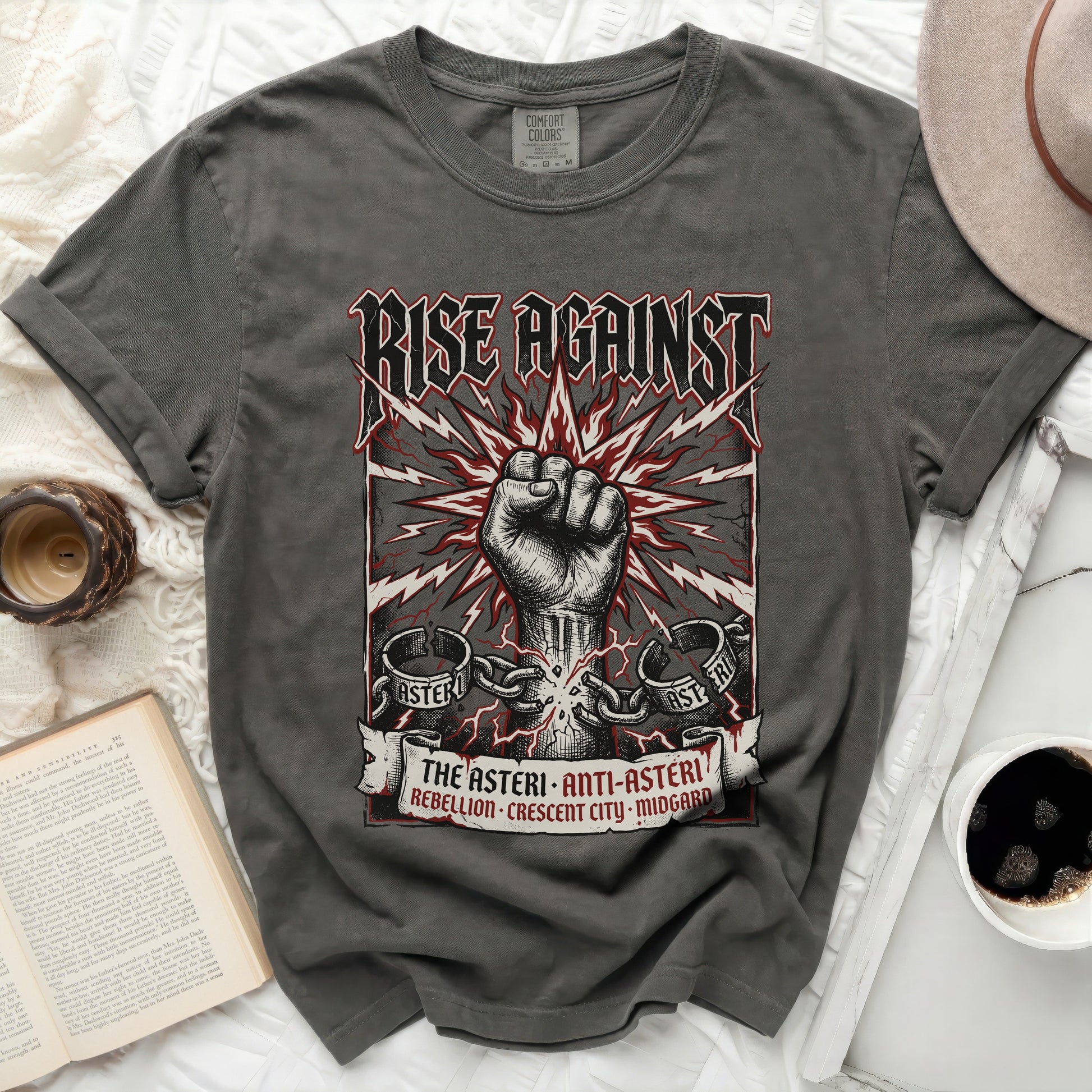 Rise Against band t-shirt with graphic of fist and banner.