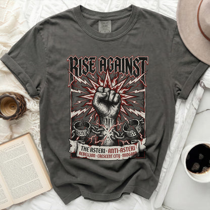 Rise Against band t-shirt with graphic of fist and banner.
