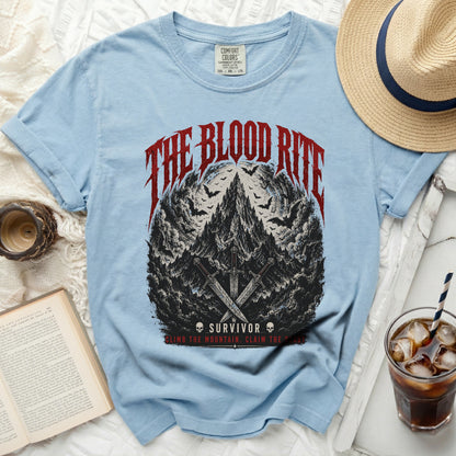 Light blue t-shirt with "The Blood Rite" graphic and swords.
