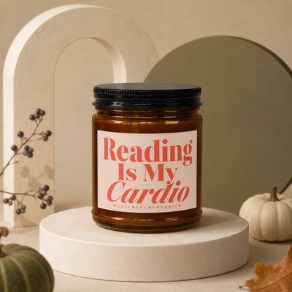Amber jar candle with black lid labeled "Reading Is My Cardio" from MagicMerchEmporium.
